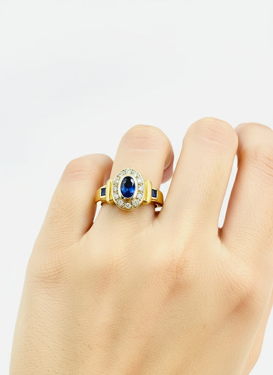 BAGUE AVEC SAPHIR BLEU ET DIAMANTS OR 750/1000
