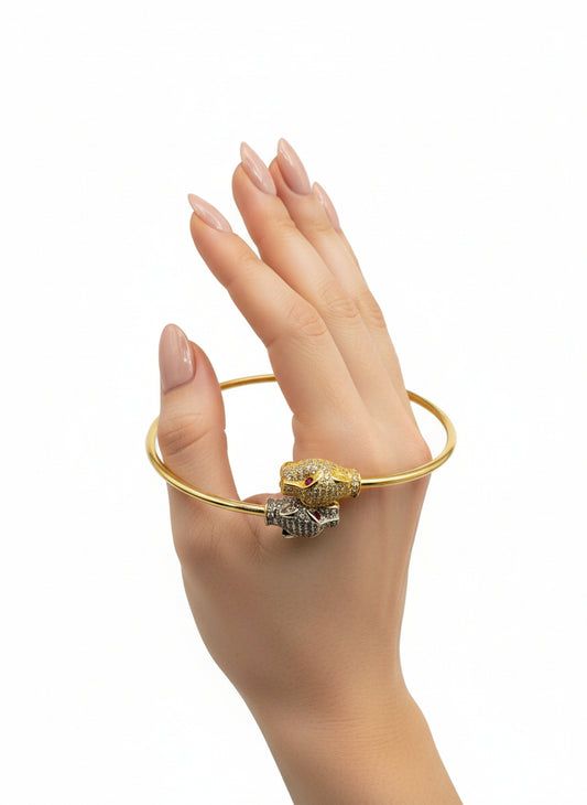 Bracelet double tête de panthère 🐆 en or 18 carats