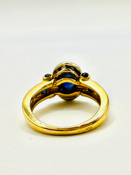 BAGUE AVEC SAPHIR BLEU ET DIAMANTS OR 750/1000